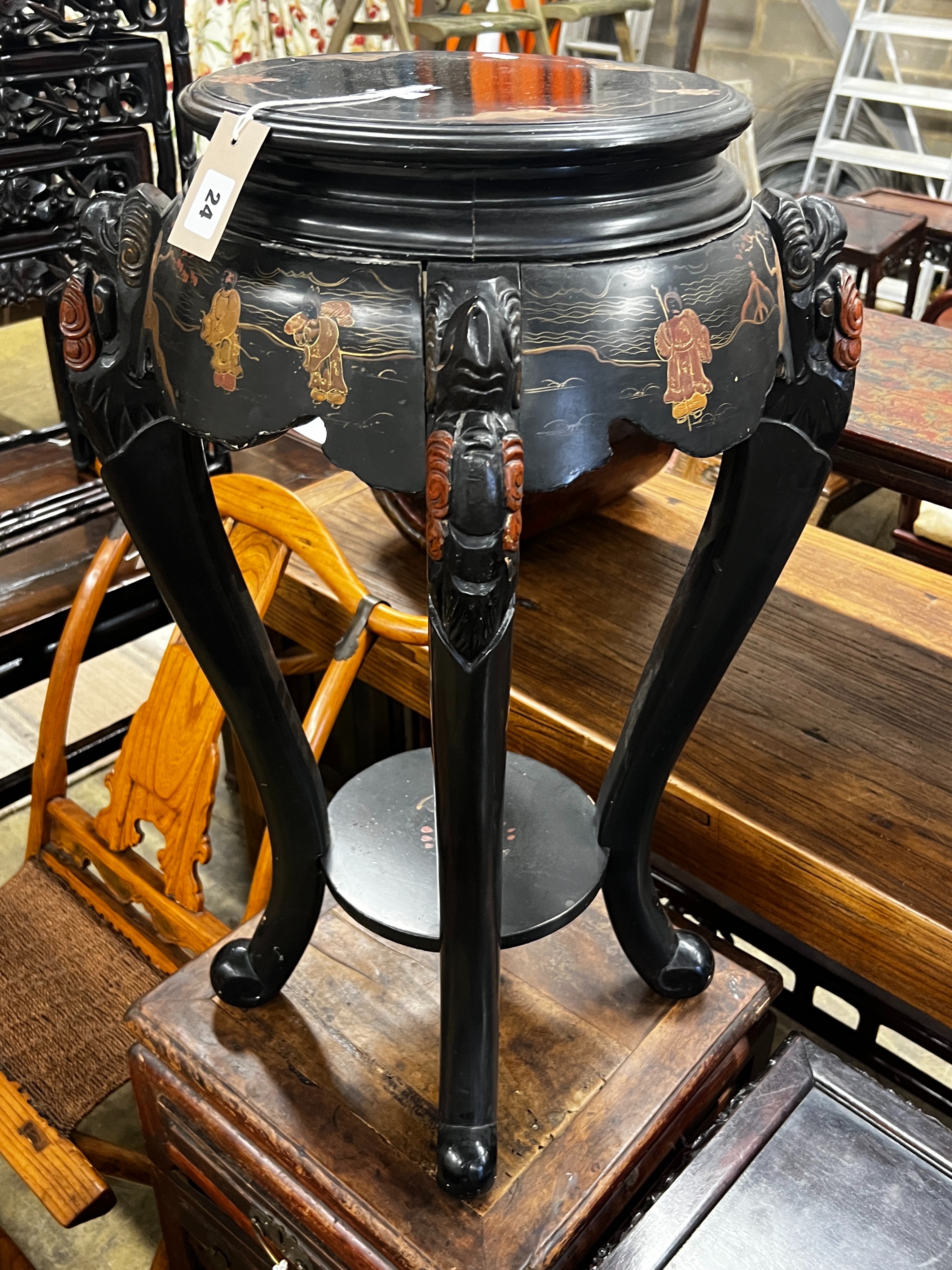 A Japanese lacquer two tier vase stand, height 76cm